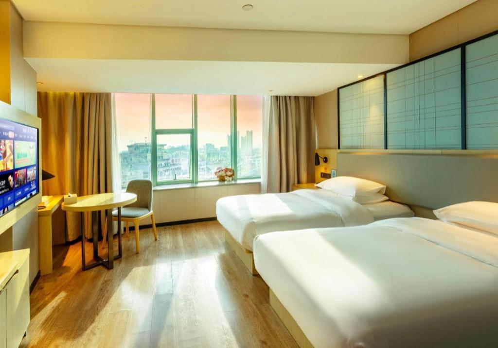 Echarm Hotel Yangjiang Baili Plaza Экстерьер фото
