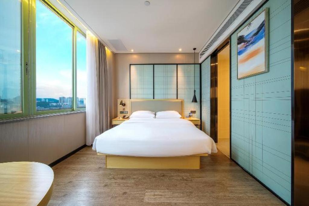 Echarm Hotel Yangjiang Baili Plaza Экстерьер фото