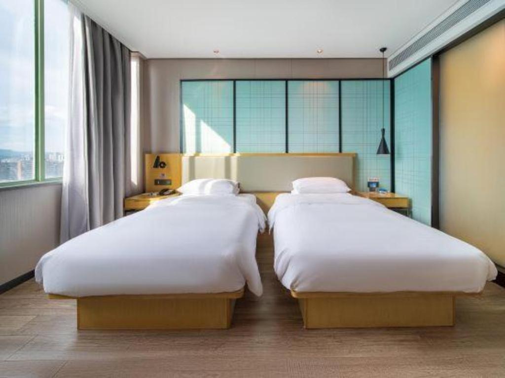 Echarm Hotel Yangjiang Baili Plaza Экстерьер фото