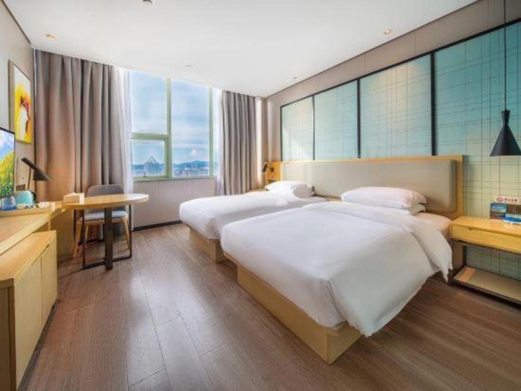 Echarm Hotel Yangjiang Baili Plaza Экстерьер фото