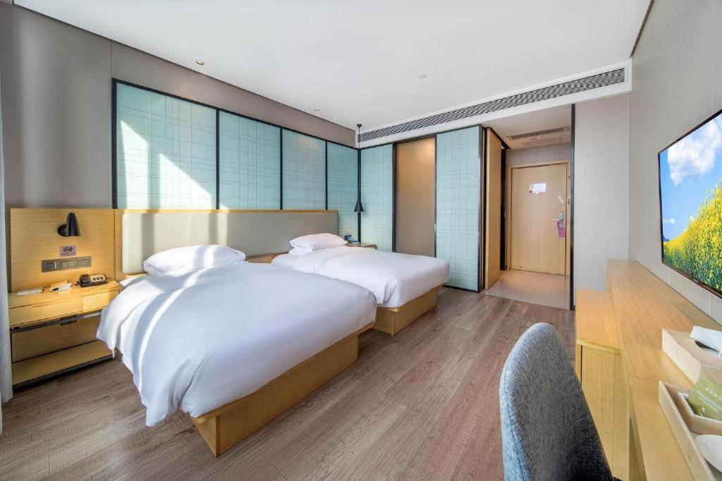 Echarm Hotel Yangjiang Baili Plaza Экстерьер фото