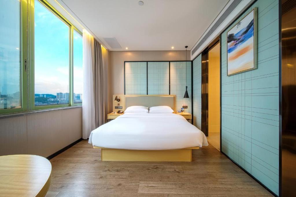Echarm Hotel Yangjiang Baili Plaza Экстерьер фото