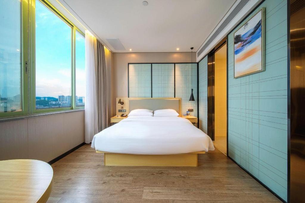Echarm Hotel Yangjiang Baili Plaza Экстерьер фото
