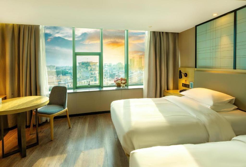 Echarm Hotel Yangjiang Baili Plaza Экстерьер фото