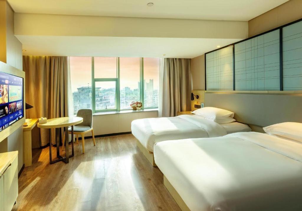 Echarm Hotel Yangjiang Baili Plaza Экстерьер фото